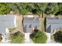 Aerial view showcasing the property's layout, landscaping, and neighborhood surroundings at 2175 Charleston Oak Cir, Lawrenceville, GA 30043