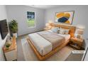 Relaxing main bedroom with soft lighting, wooden accents, and modern decor at 4504 Cedar Ridge Trl, Stone Mountain, GA 30083
