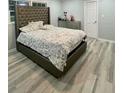 Tastefully decorated bedroom with a stylish headboard and plenty of natural light at 1838 Cates Ct, Snellville, GA 30078