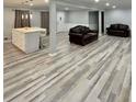 Open concept living area featuring modern flooring and comfortable seating at 1838 Cates Ct, Snellville, GA 30078