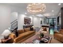 Spacious living room with hardwood floors and contemporary furnishings, leading into the modern kitchen at 721 Longleaf Ne Dr # 3, Atlanta, GA 30342