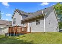 The backyard features a wooden deck, providing a relaxing outdoor living area at 9511 Rollinghills Dr, Jonesboro, GA 30238