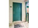 A warm welcome awaits at the inviting front door with the unit number and a 'Welcome Friends' mat at 721 Beaufort Cir, Duluth, GA 30096