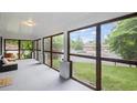 Bright and airy screened porch with views of the surrounding neighborhood at 1591 Jonesboro Se Rd, Atlanta, GA 30315