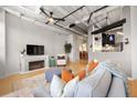 Inviting living room with fireplace, lots of natural light, and open floor plan at 878 Peachtree Ne St # 431, Atlanta, GA 30309