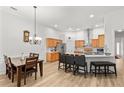 Open concept kitchen featuring stainless steel appliances, a breakfast bar, and ample cabinet space, perfect for entertaining at 2319 Alnwick Dr, Duluth, GA 30096