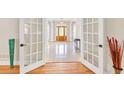Bright foyer featuring marble floors and elegant front door at 328 Broadmoor Way, Mcdonough, GA 30253
