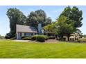 Well-manicured lawn and established landscaping enhance the curb appeal of this charming home at 2790 Shiloh Way, Snellville, GA 30039
