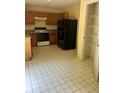 Functional kitchen with essential appliances at 4752 Browns Mill Ferry Rd, Lithonia, GA 30038