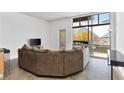 Bright living room showcasing large windows, open floor plan, and modern urban design elements at 89 Mangum St # 210, Atlanta, GA 30313