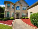 Beautiful brick home with manicured landscaping and a welcoming entrance at 842 Treeline Dr, Conyers, GA 30016