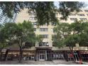 The exterior elevation shows the modern building and ground-level retail spaces with inviting curb appeal at 878 Peachtree St # 601, Atlanta, GA 30309