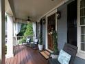 Relaxing front porch with rocking chairs and stylish decor, perfect for enjoying the outdoors at 1205 Renaissance Se Ct, Mableton, GA 30126