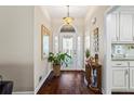 Welcoming foyer features hardwood floors, natural light, and decorative accents at 2191 Flowering Dr, Grayson, GA 30017