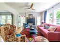 Cozy living room features hardwood floors, fireplace, and an abundance of natural light at 588 Oakdale Ne Rd, Atlanta, GA 30307