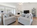 Bright living room with neutral tones, vaulted ceilings, a fireplace, and hardwood floors at 3259 Mcever Park Cir, Acworth, GA 30101