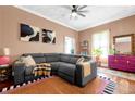 Cozy living room boasts a plush sectional and eye-catching accents at 1608 Carroll Nw Dr, Atlanta, GA 30318