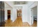 Inviting foyer with hardwood floors, a high ceiling, and access to multiple rooms at 1425 Turtle Dove Ln, Lawrenceville, GA 30043