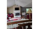 Inviting living room with vaulted ceilings, a fireplace, and lots of space for relaxing at 144 Boones Ridge Se Pkwy, Acworth, GA 30102