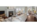 Inviting living room featuring a fireplace, comfortable seating, and elegant decor at 4922 Carson Glen Ln, Acworth, GA 30101