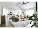 Spacious open-concept living room and kitchen with modern decor and ample natural light at 4811 Lake Park Ter, Acworth, GA 30101