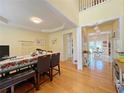 Bright dining room featuring wood floors, chandelier, and seating at 634 Friars Head Dr, Suwanee, GA 30024