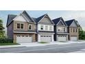 New townhomes feature brick and siding exteriors, garages, and well-manicured lawns at 3106 Marbella Cir # 3, Kennesaw, GA 30152
