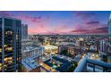 Stunning city skyline view at twilight from a high-rise balcony at 855 Peachtree Ne St # 3005, Atlanta, GA 30308
