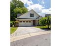 Charming single-Gathering home with a brick facade and a two-car garage at 10110 Malcolm Ct, Covington, GA 30014