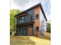 Stylish two-story home with modern design elements and a well-maintained lawn at 104 Meldon Ave, Atlanta, GA 30315