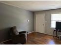 Cozy living room featuring neutral walls, hardwood floors, and natural light at 3127 Latona Sw Dr, Atlanta, GA 30354