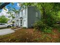 Attractive exterior featuring modern siding, bay windows, and lush greenery at 3001 Majestic Park Ct, Duluth, GA 30096