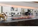 Stylish living room with a fireplace and open layout to the kitchen, perfect for modern living at 187 Clay Se St, Atlanta, GA 30317