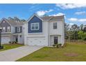Charming two-story home with white brick and a two-car garage at 2789 Aralynn Way, College Park, GA 30337