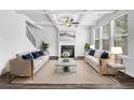Bright living room with coffered ceiling, fireplace, and large windows at 2789 Aralynn Way, College Park, GA 30337