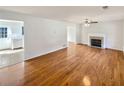 Bright living room with hardwood floors and fireplace at 3479 Woodruff Ridge Ln, Loganville, GA 30052