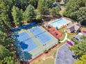 Aerial view of the community pool, tennis courts, and clubhouse amenities at 3725 Falls Trl, Winston, GA 30187