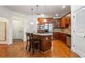 Modern kitchen with stainless steel appliances, granite countertops, and an island at 825 Highland Ne Ln # 1116, Atlanta, GA 30306