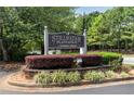Stillwater Plantation community sign surrounded by manicured landscaping and lush greenery at 4234 Stillwater Dr, Duluth, GA 30096