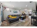 Spacious living room featuring modern furniture and decor in neutral colors at 135 N North River Dr, Atlanta, GA 30350