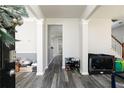 Open foyer featuring gray wood-look floors and white trim details at 2412 Wingfield Dr, Austell, GA 30106