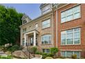 Charming brick townhome with well-maintained landscaping and inviting front entrance at 359 Alderwood Ln, Atlanta, GA 30328