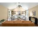 Bright living room featuring vaulted ceilings, built-in cabinets, and stylish decor at 166 Martha Ave, Atlanta, GA 30317
