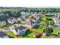 Aerial view of home in a neighborhood featuring a spacious backyard with privacy fence at 160 Oak Manor Dr, Covington, GA 30016
