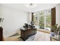 Office space with large window and hardwood floors at 1323 Peachtree Ne Vw, Atlanta, GA 30319