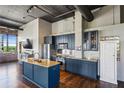 Gourmet kitchen with an island, stainless steel appliances, and granite countertops at 3180 Mathieson Ne Dr # 1001, Atlanta, GA 30305
