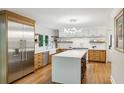 Modern kitchen with stainless steel appliances, a large island, and ample cabinet space at 1130 Angelo Ne Ct, Atlanta, GA 30319