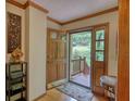 Inviting home entrance with a beautiful wood door and stylish interior design elements at 3311 Creek Hollow Dr, Marietta, GA 30062