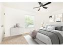 Serene bedroom with a neutral palette, dresser, comfortable bed and natural light at 6109 Park Ave, Atlanta, GA 30342