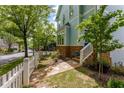 Landscaped yard featuring a stone walkway and well-maintained lawn at 1560 Gilstrap Nw Ln, Atlanta, GA 30318